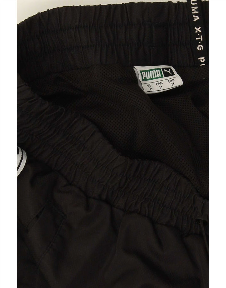 Puma Herren-Trainingshose mit Grafik, mittelgroß, Schwarz, Farbblock
