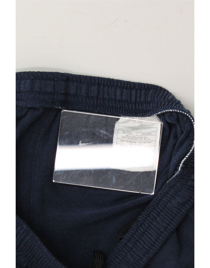 NIKE Womens Tracksuit Trousers UK 12/14 Large  Navy Blue Polyester Vintage Nike and Second-Hand Nike from Messina Hembry 