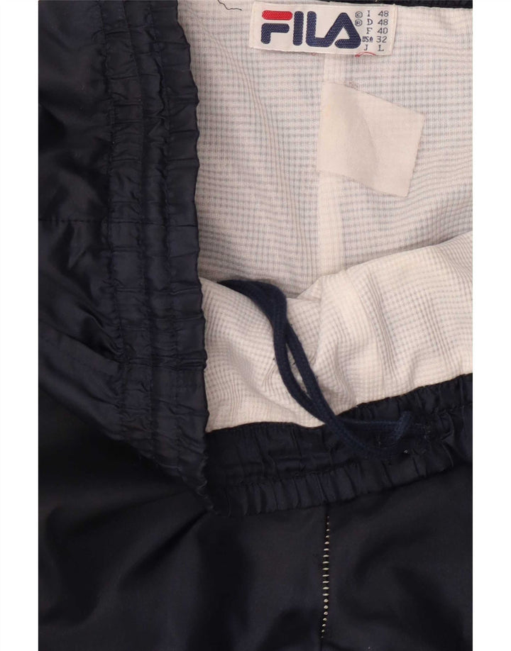 Fila Træningsdragt til mænd Joggers IT 48 Medium Navy Blue Colourblock