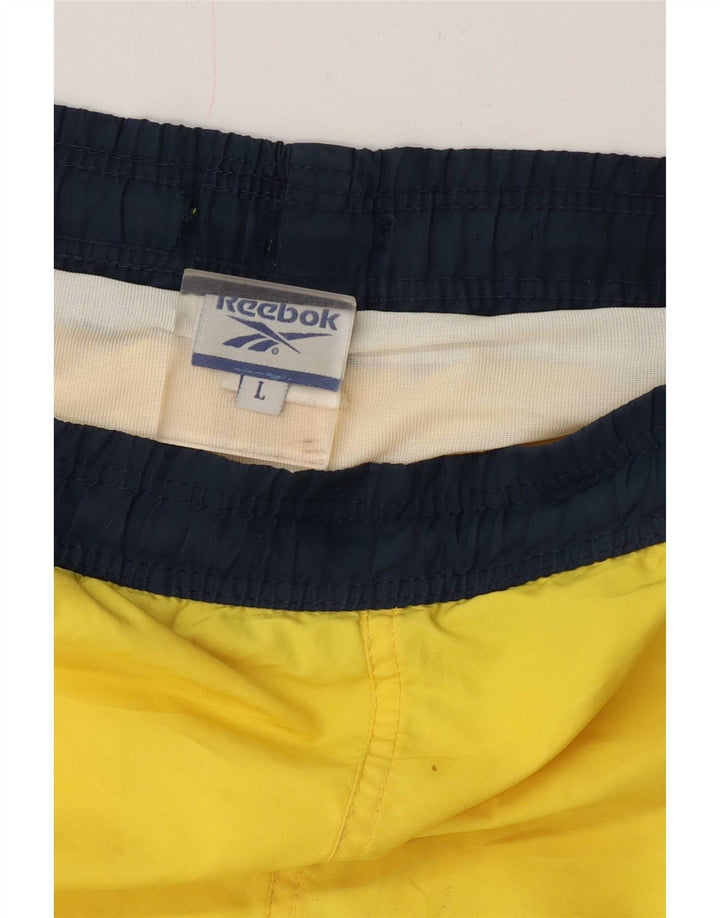 Pantaloncini sportivi Reebok da uomo grandi color giallo