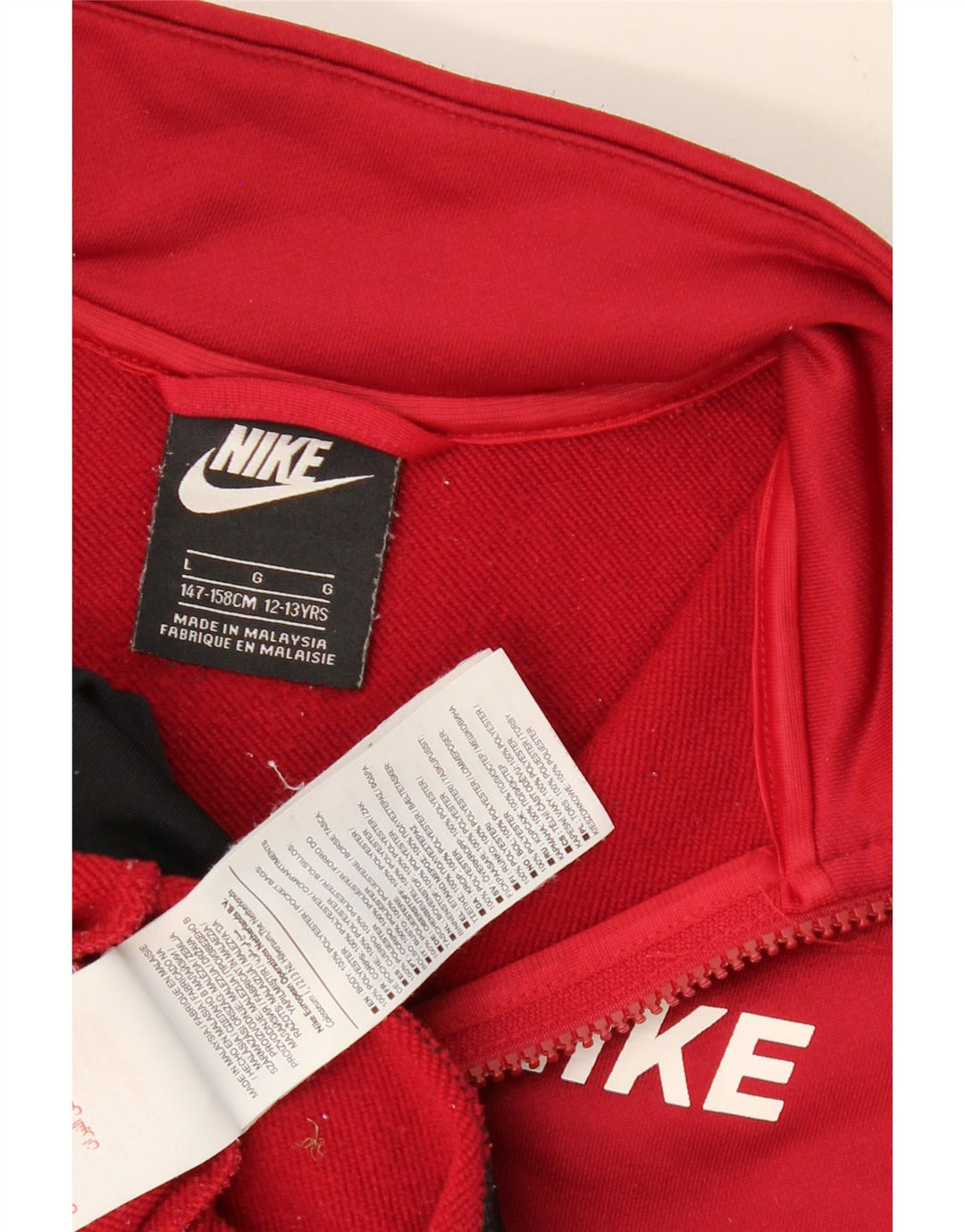 NIKE Boys Tracksuit Top Jacket 12-13 Years Large  Red Colourblock Vintage Nike and Second-Hand Nike from Messina Hembry 