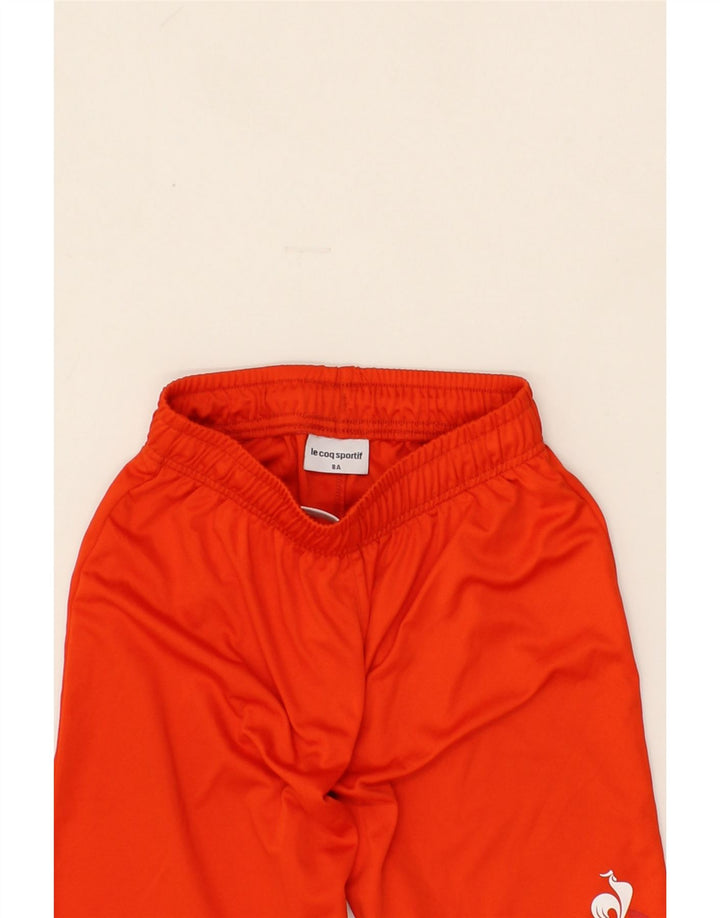LE COQ SPORTIF Boys Sport Shorts 7-8 Years Red Polyester Vintage Le Coq Sportif and Second-Hand Le Coq Sportif from Messina Hembry 