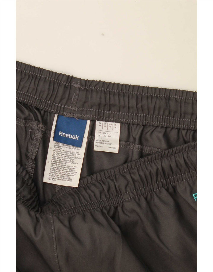 Damskie spodnie dresowe Reebok UK 12, poliester w kolorze średnioszarym