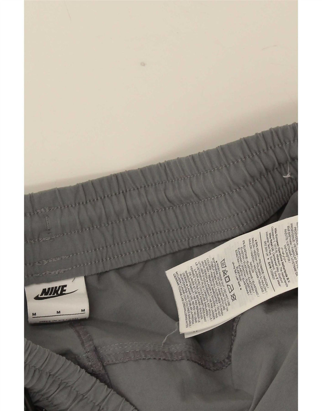 Pantaloni da tuta Nike da uomo cargo da jogging in nylon grigio medio