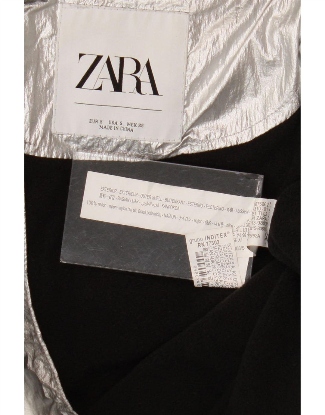 Giacca imbottita con cappuccio grafica oversize da donna Zara EU 38 piccola in nylon argento