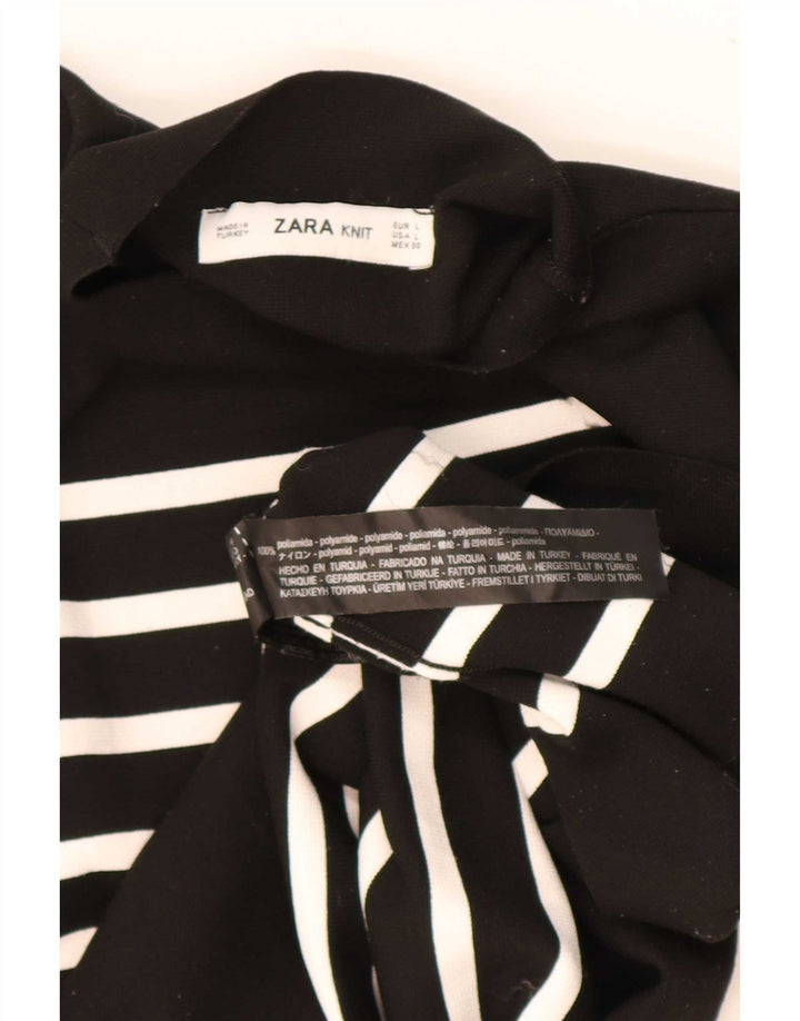 Top feminino Zara de manga comprida UK 14 grande poliamida listrada preta