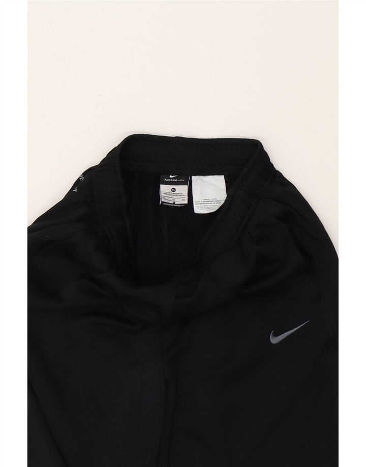 NIKE Boys Tracksuit Trousers 13-14 Years XL Black Polyester Vintage Nike and Second-Hand Nike from Messina Hembry 