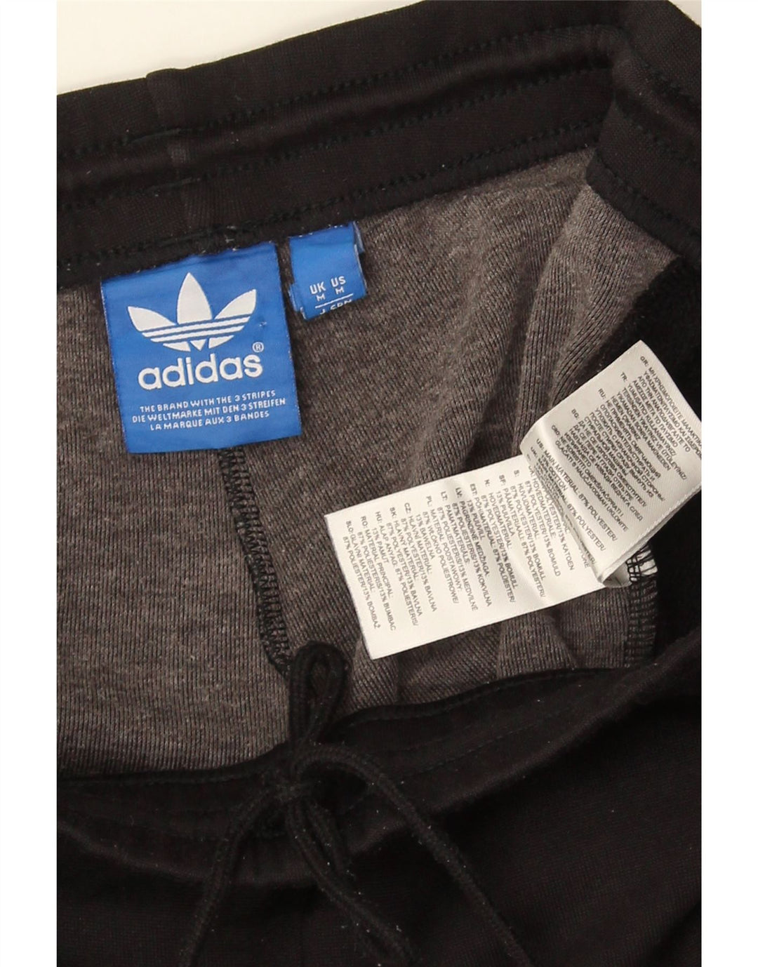 Pantaloni da tuta grafica da uomo Adidas, poliestere color block medio nero