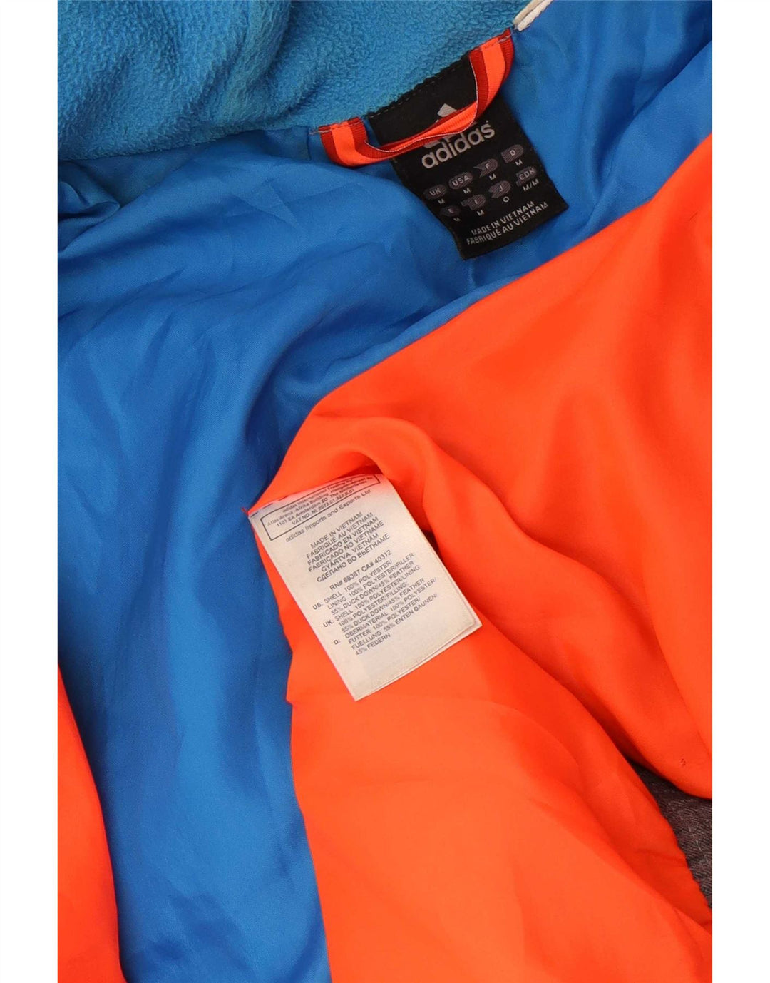Adidas Chaqueta acolchada holgada con capucha para hombre UK 38 Poliéster gris medio
