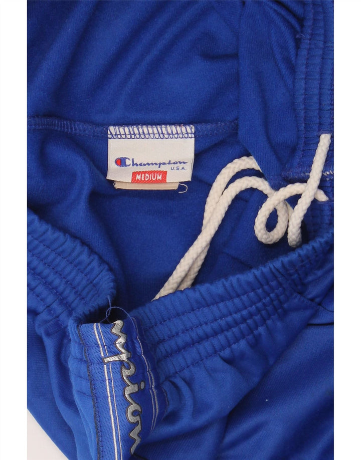 CHAMPION Mens Graphic Tracksuit Trousers Medium  Blue Polyester Vintage Champion and Second-Hand Champion from Messina Hembry 