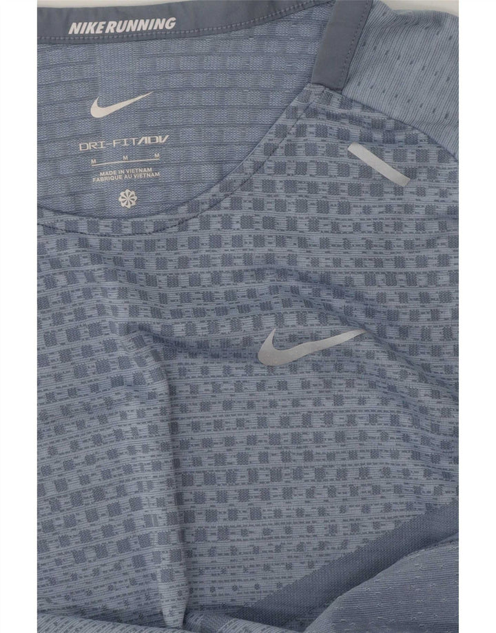 T-shirt Nike Dri Fit da donna Top UK 14 Poliestere geometrico blu medio