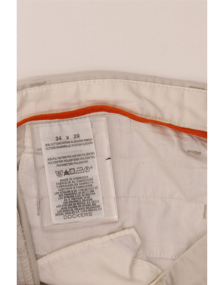 DOCKERS Mens Pegged Chino Trousers W34 L29 Beige Cotton Vintage Dockers and Second-Hand Dockers from Messina Hembry 