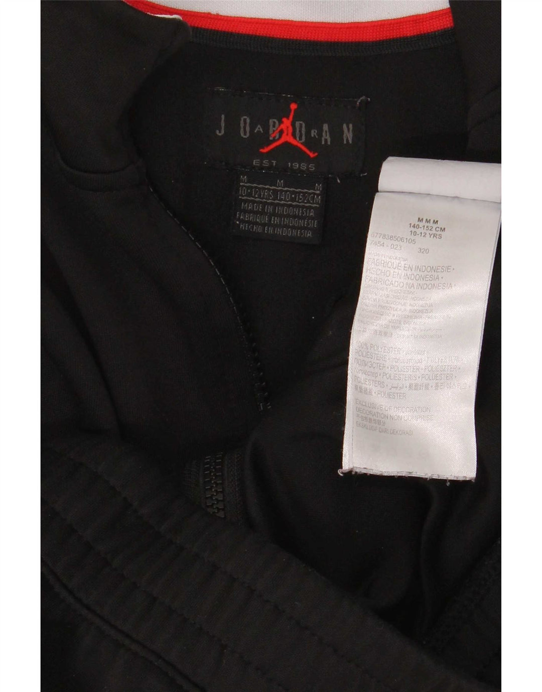 Giacca superiore della tuta da ragazzo Jordan 10-11 anni blocco colore nero medio