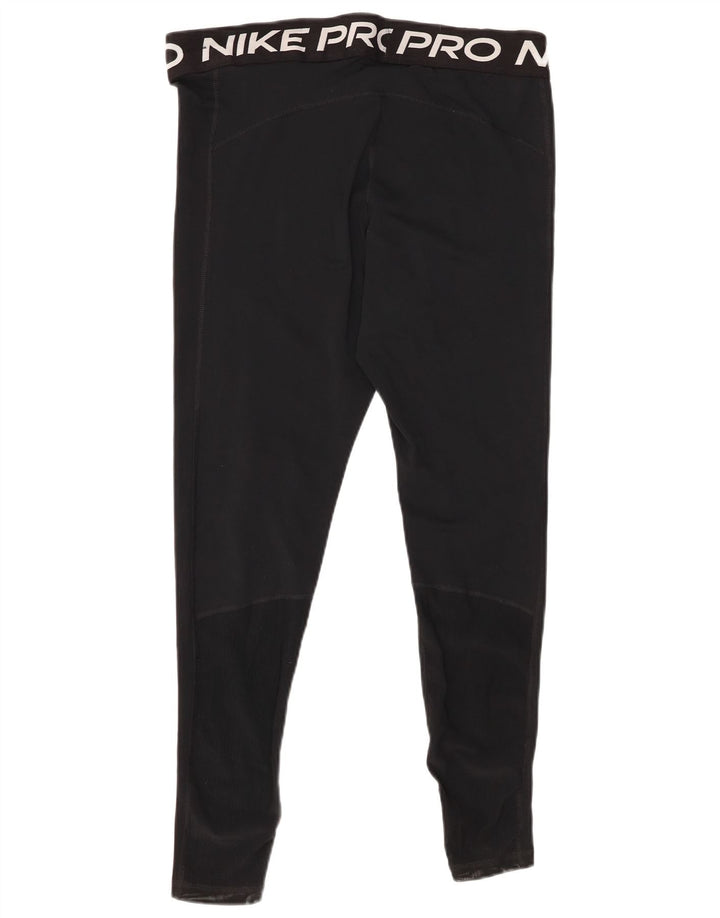 Damskie legginsy Nike Graphic UK 18 XL, czarne, poliestrowe