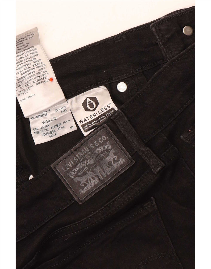 Levi's ženske 712 uske traperice W30 L32 crni pamuk