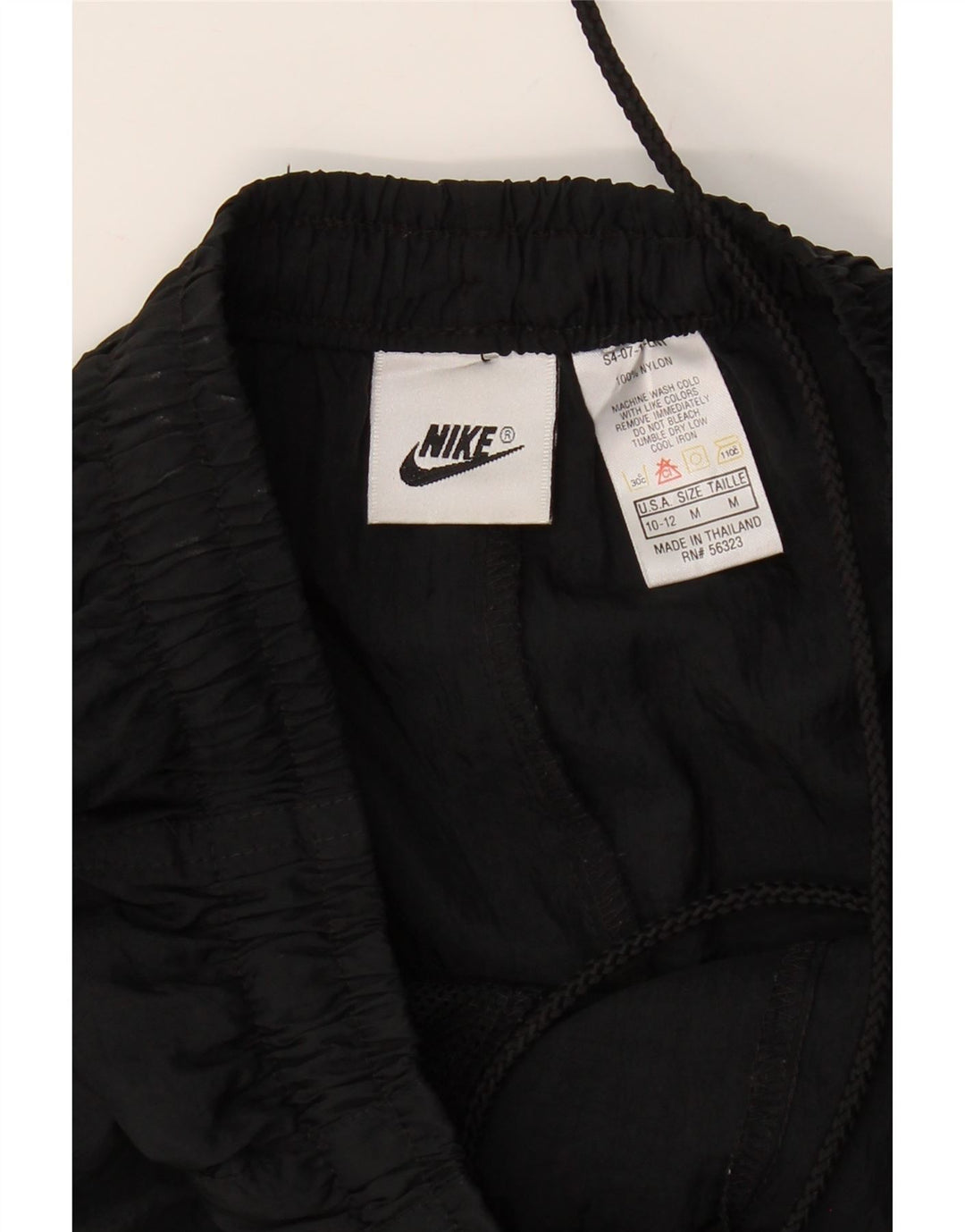NIKE Womens Tracksuit Trousers Joggers US 10/12 Medium  Black Nylon Vintage Nike and Second-Hand Nike from Messina Hembry 