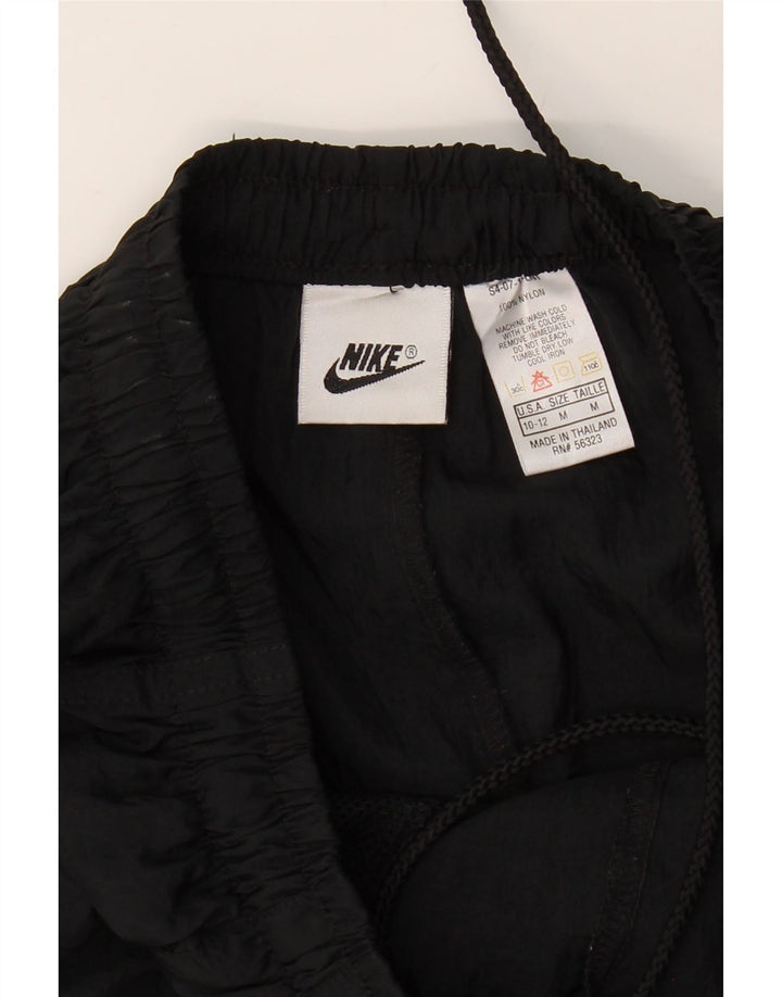 NIKE Womens Tracksuit Trousers Joggers US 10/12 Medium  Black Nylon Vintage Nike and Second-Hand Nike from Messina Hembry 