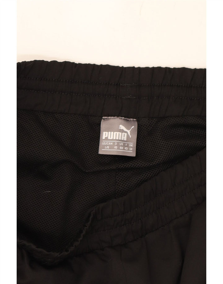 PUMA Womens Tracksuit Trousers Joggers UK 14 Large Black Polyester Vintage Puma and Second-Hand Puma from Messina Hembry 