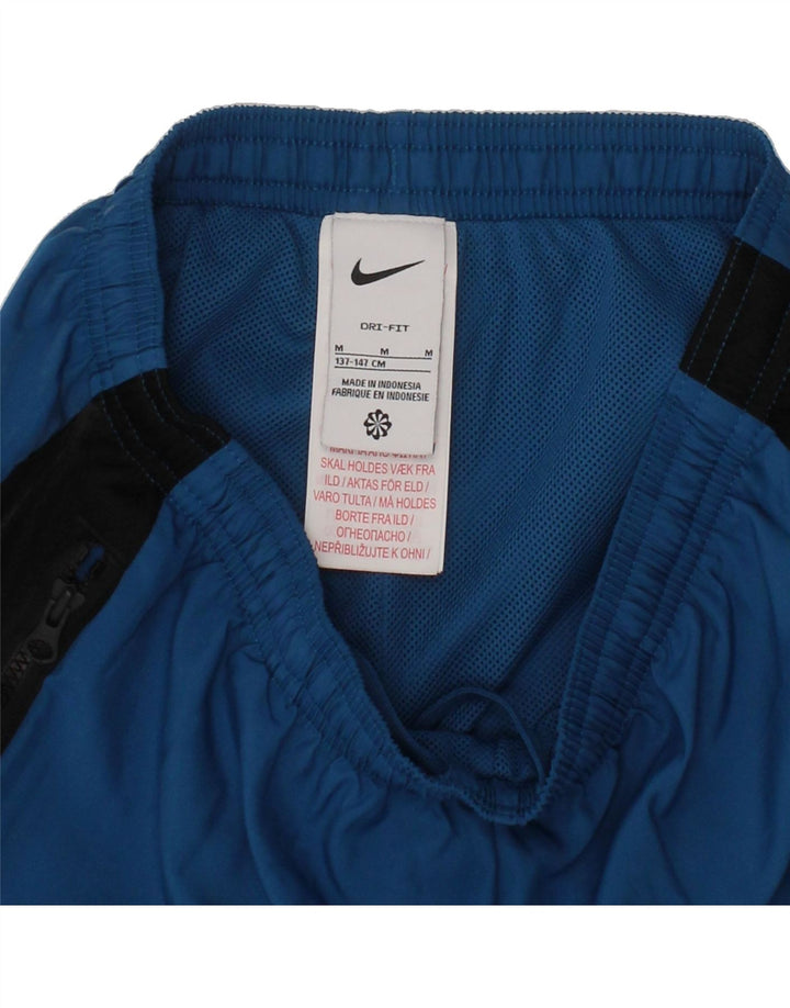 NIKE Boys Dri Fit Tracksuit Trousers Joggers 10-11 Years Medium Blue Vintage Nike and Second-Hand Nike from Messina Hembry 