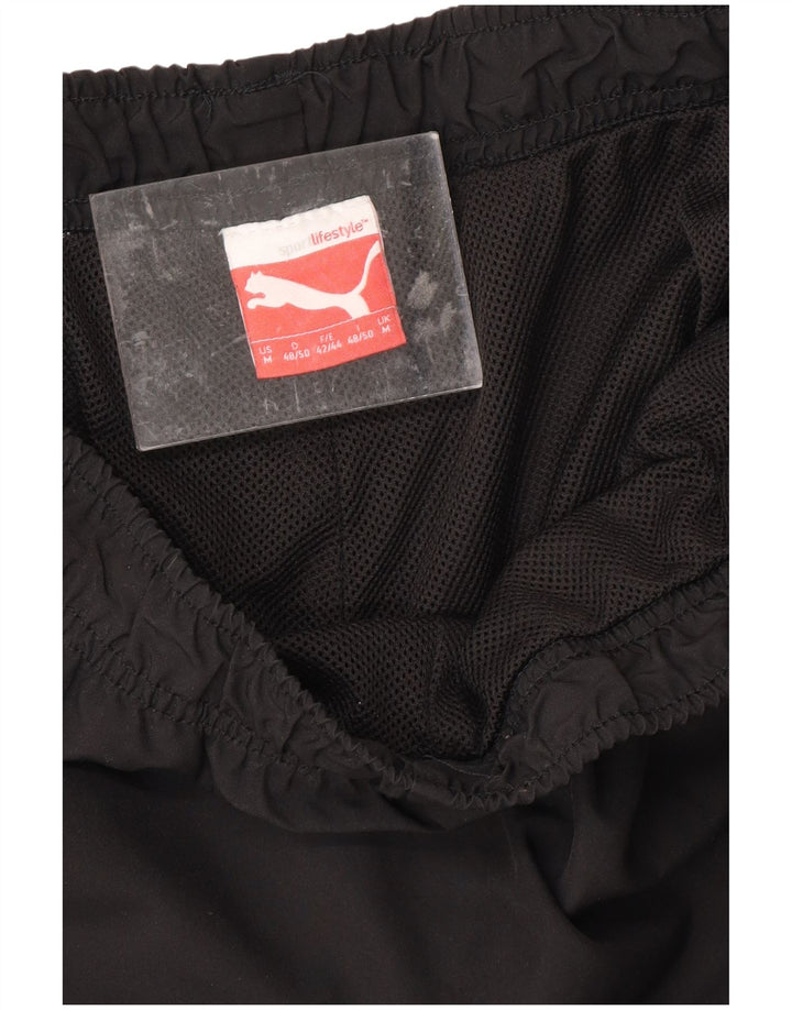 Pantaloni de trening PUMA Graphic Capri pentru bărbați, negru mediu