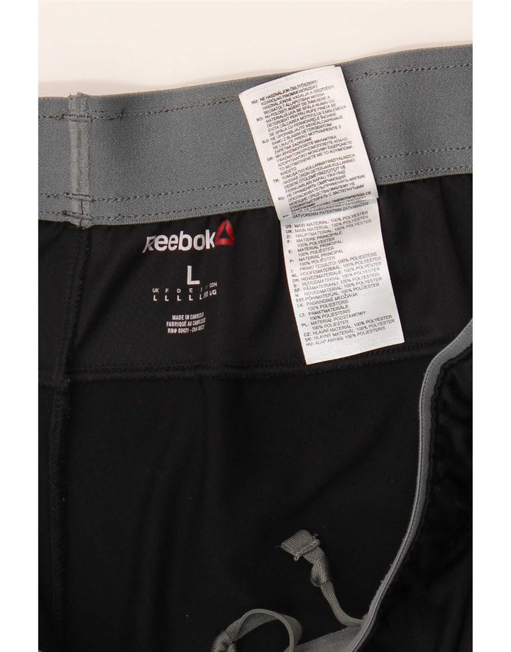 Reebok Pantalon de Survêtement Homme Large Noir Polyester