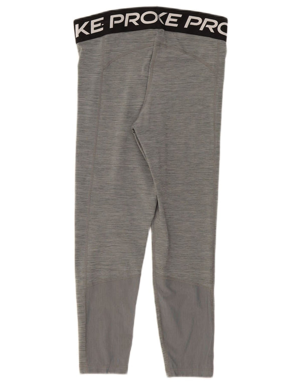 Damskie legginsy Nike Dri Fit Capri Graphic UK 14 Średnioszare, nakrapiane sportowe