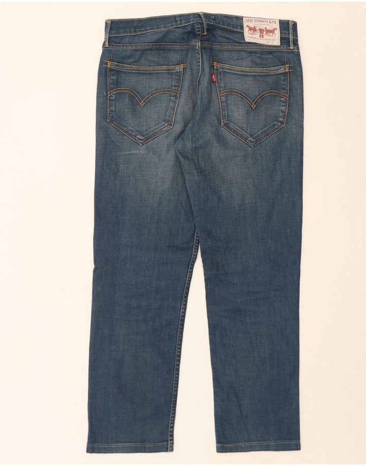 LEVI'S Mens 519 Slim Jeans W32 L27 Blue Cotton Vintage Levi's and Second-Hand Levi's from Messina Hembry 