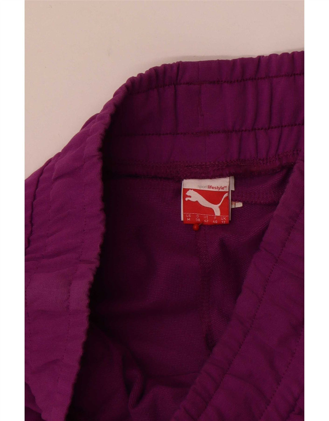 Pantaloncini sportivi Bermuda da donna Puma UK 12 viola medio