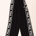 FILA Womens Graphic Tracksuit Trousers UK 6 XS  Black Polyester Vintage Fila and Second-Hand Fila from Messina Hembry 