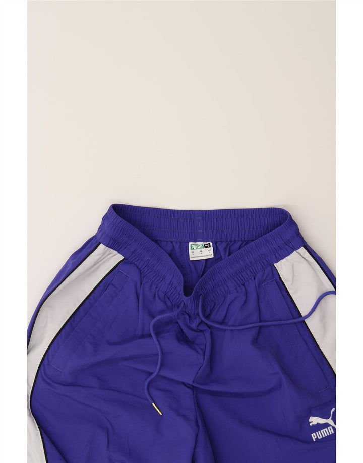 PUMA Mens Tracksuit Trousers Small  Blue Colourblock Nylon Vintage Puma and Second-Hand Puma from Messina Hembry 