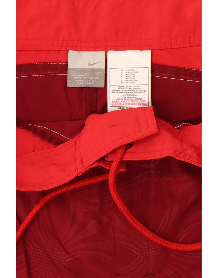 Pantaloncini da bagno da uomo Nike in nylon floreale rosso medio