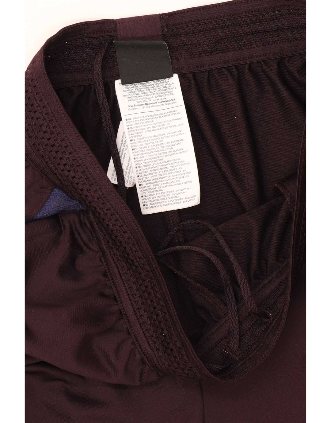 Pantaloni della tuta da uomo Nike Barcelona, poliestere color block medio nero