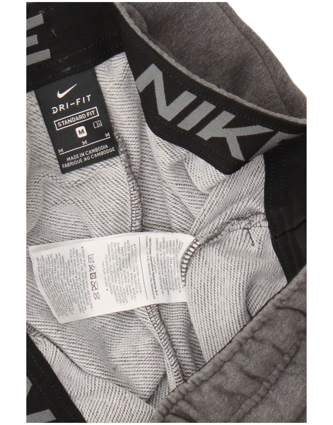 Pantaloni da tuta da uomo Nike Dri Fit Joggers grigio medio chiazzato