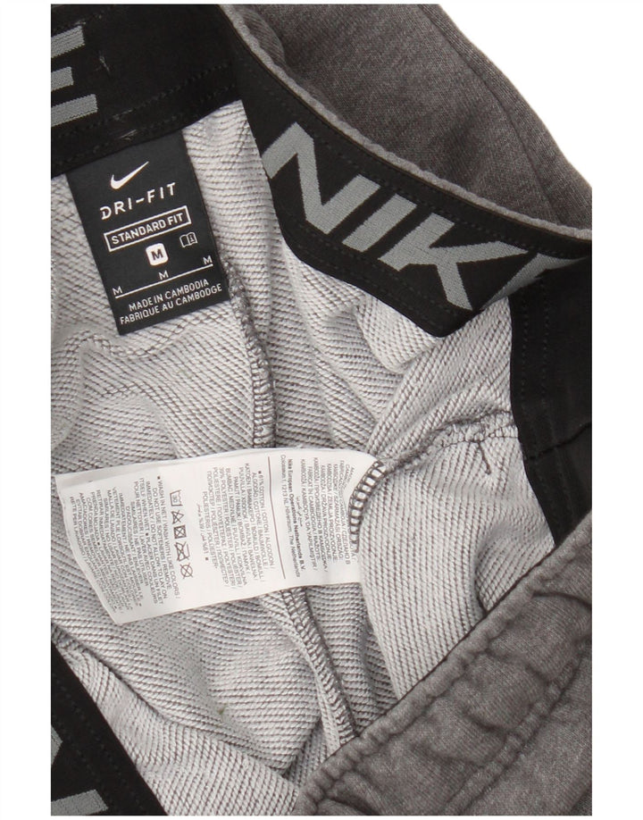 Pantaloni da tuta da uomo Nike Dri Fit Joggers grigio medio chiazzato